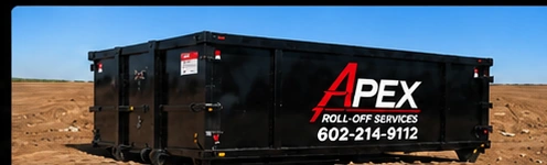Illustrative Apex 24-yard dumpster on a plain dirt lot